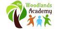 The Woodlands Academy logo
