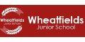 Wheatfields Junior School logo